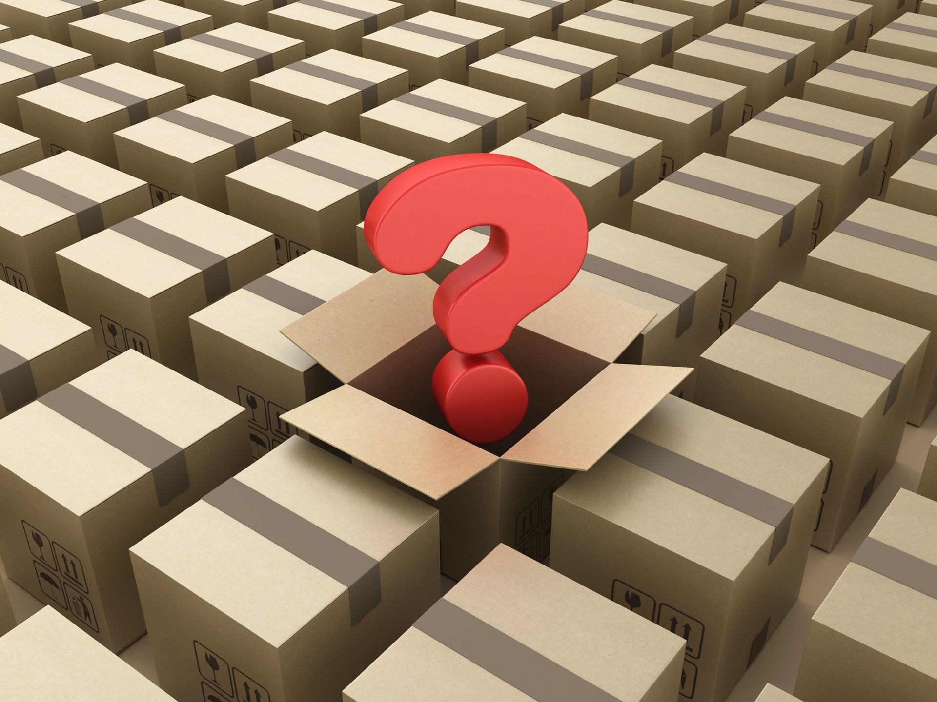 Cajas de cartón una abierta con un signo de interrogación
